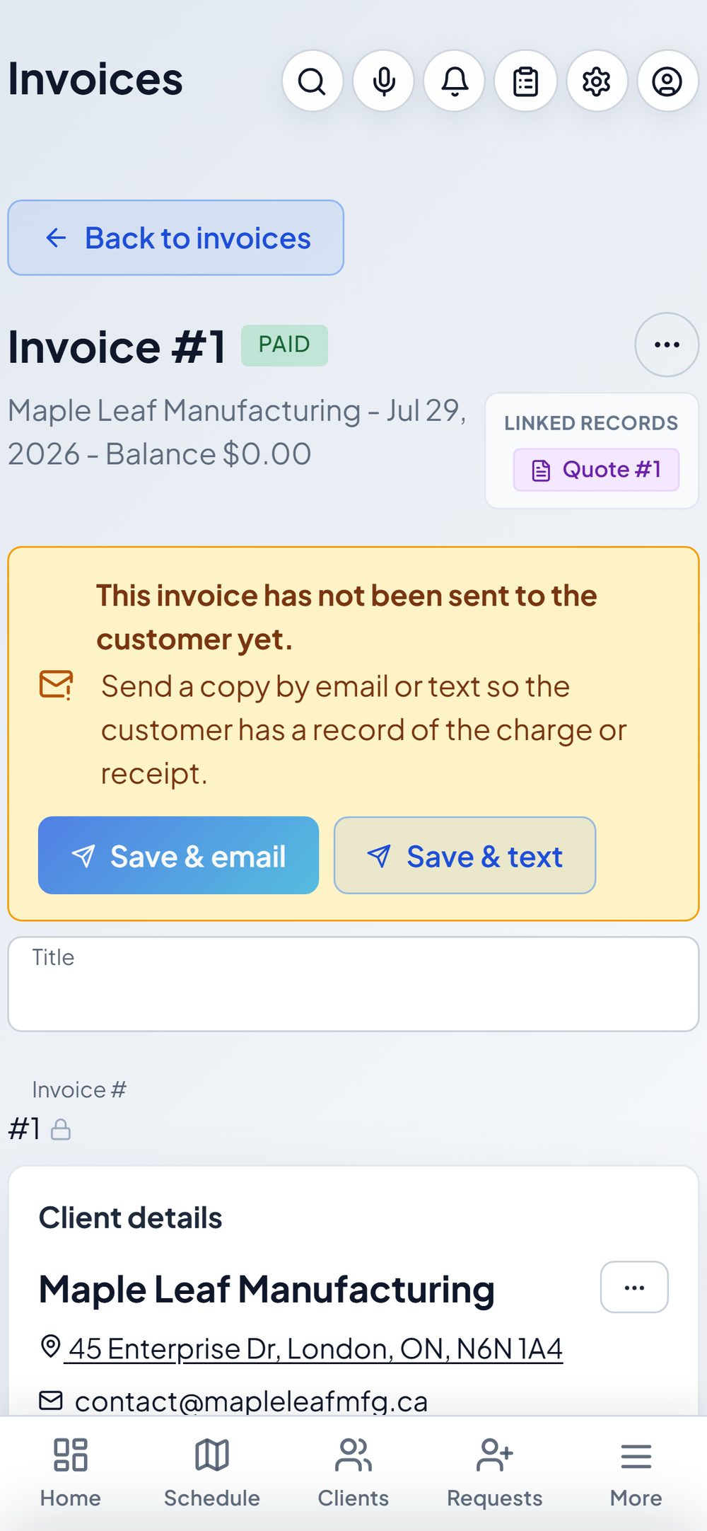 A paid invoice with options to send a copy by email or text